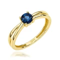 Złoty pierścionek z London Blue Topaz i zaplataną szyną próba 585