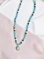 Naszyjnik stal chirurgiczna błękitne koraliki choker z kwiatkiem
